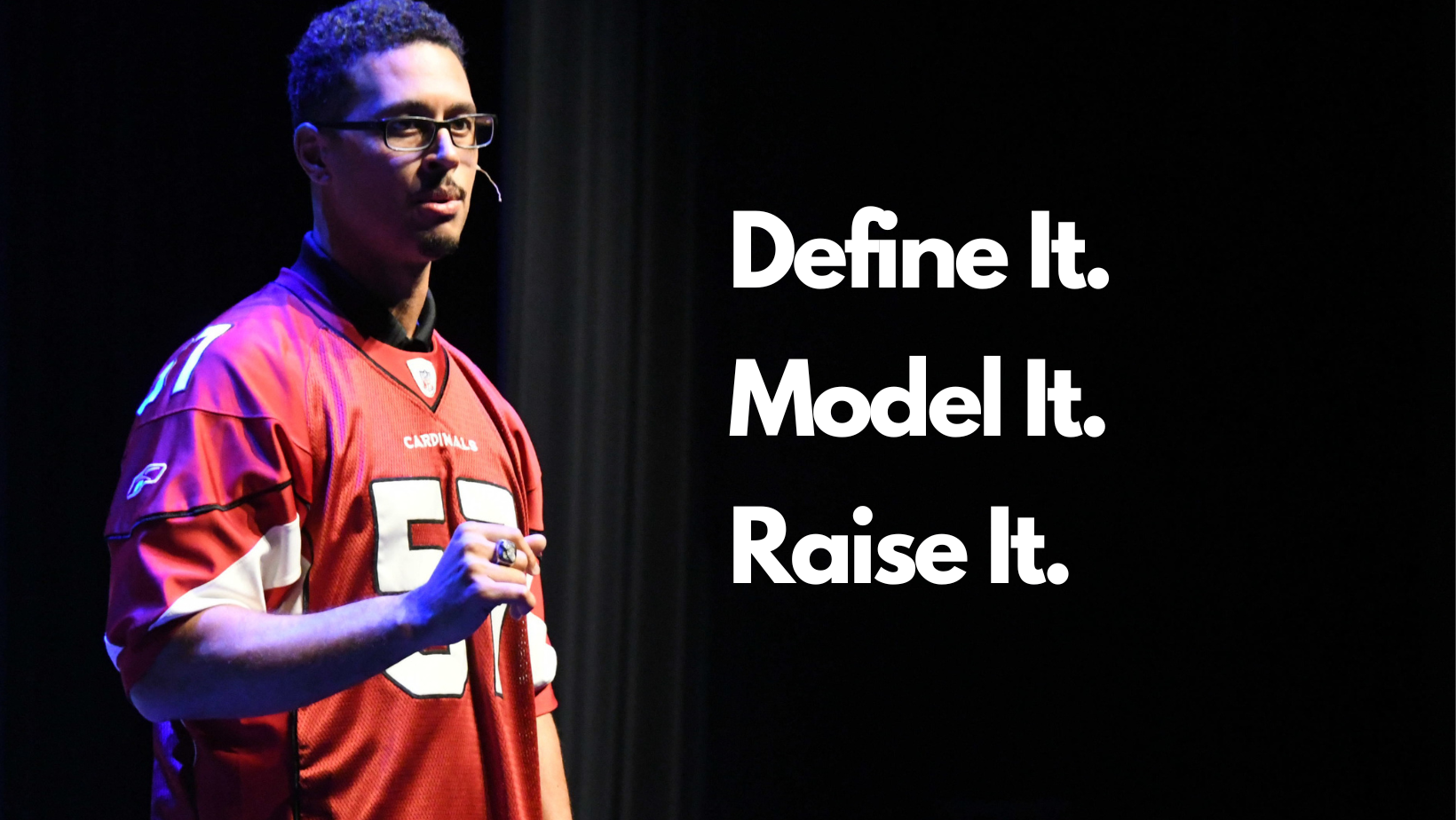 David Holloway delivers a leadership keynote training on stage