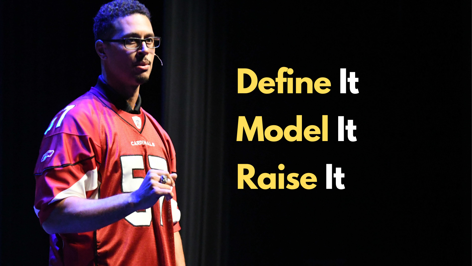 David Holloway delivers a leadership masterclass training on stage
